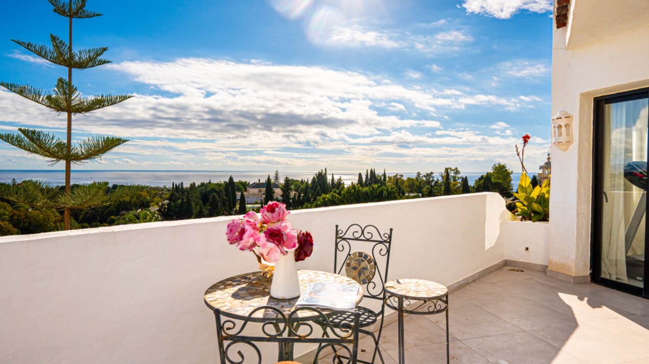 Stunning Marbella penthouse exudes elegance from its prime location within elite gated community.