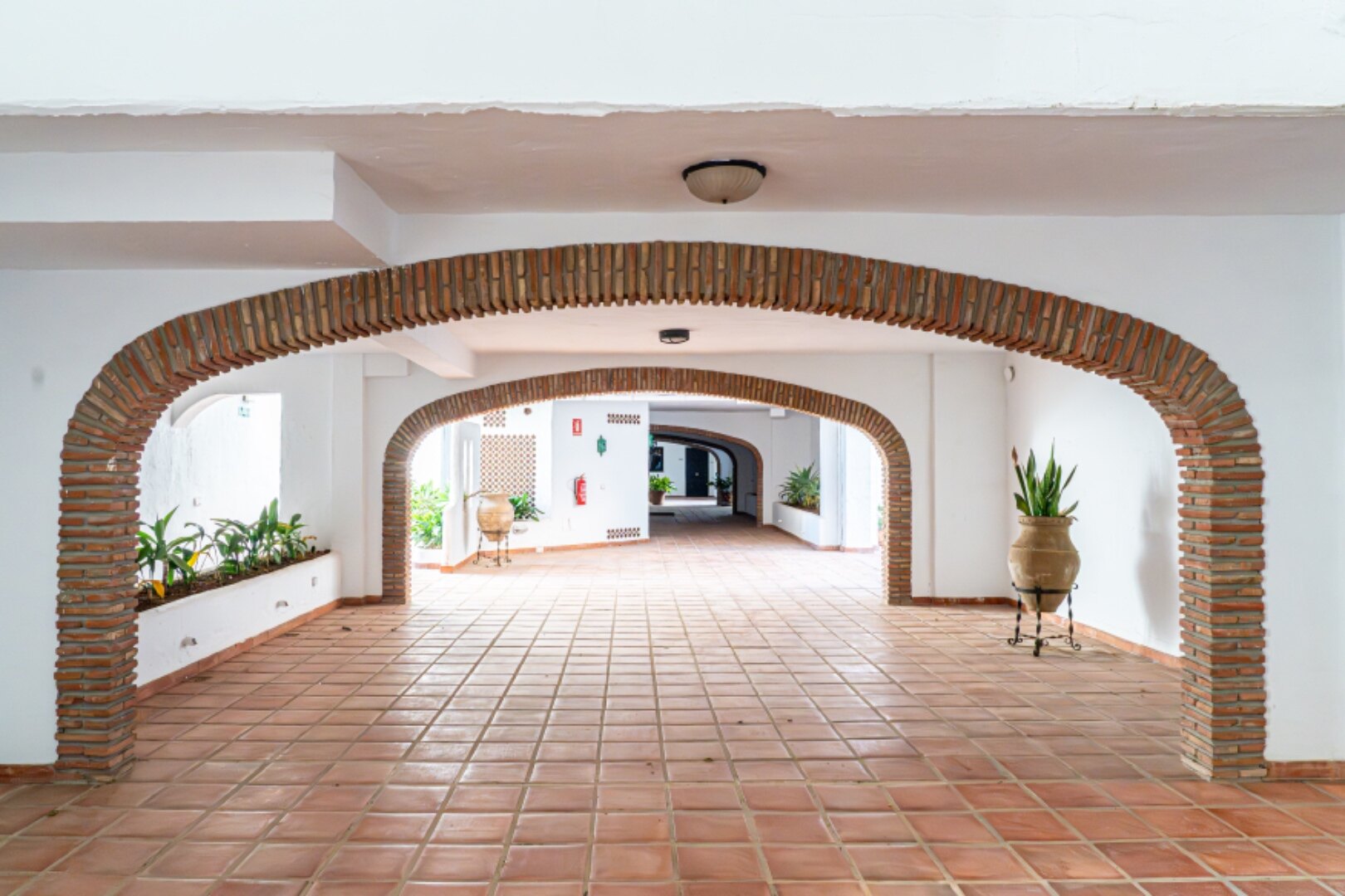 Stunning Marbella penthouse exudes elegance from its prime location within elite gated community.