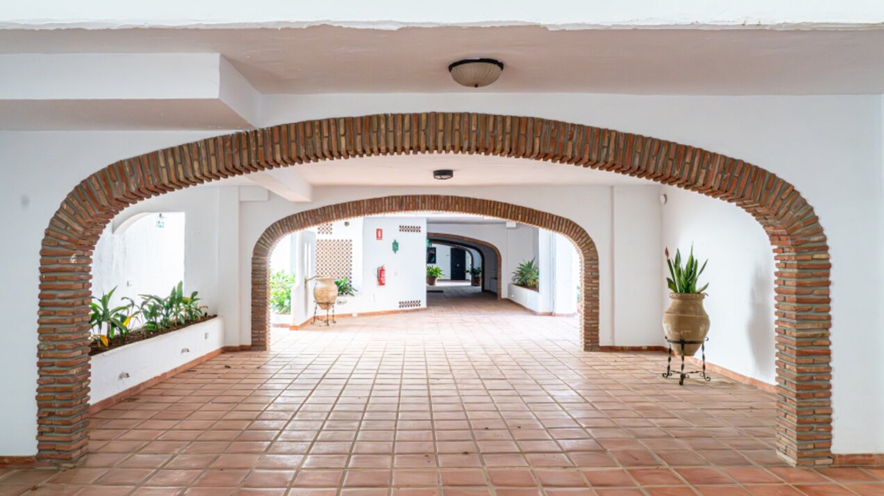 Stunning Marbella penthouse exudes elegance from its prime location within elite gated community.