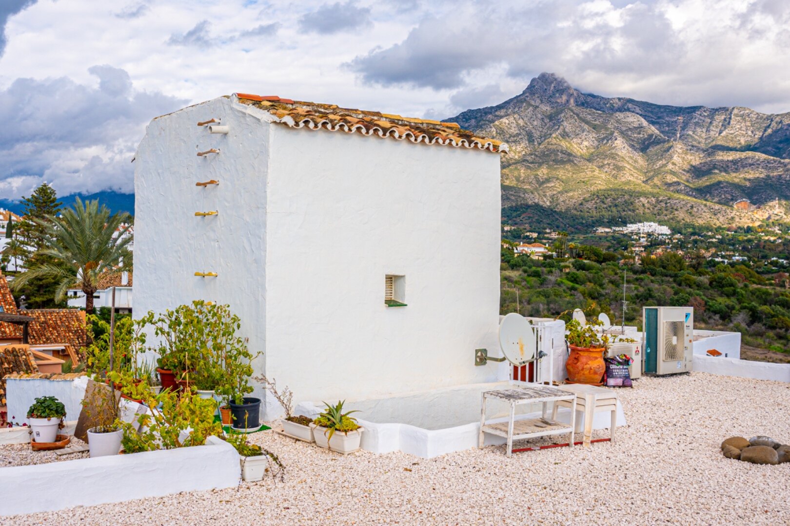Stunning Marbella penthouse exudes elegance from its prime location within elite gated community.