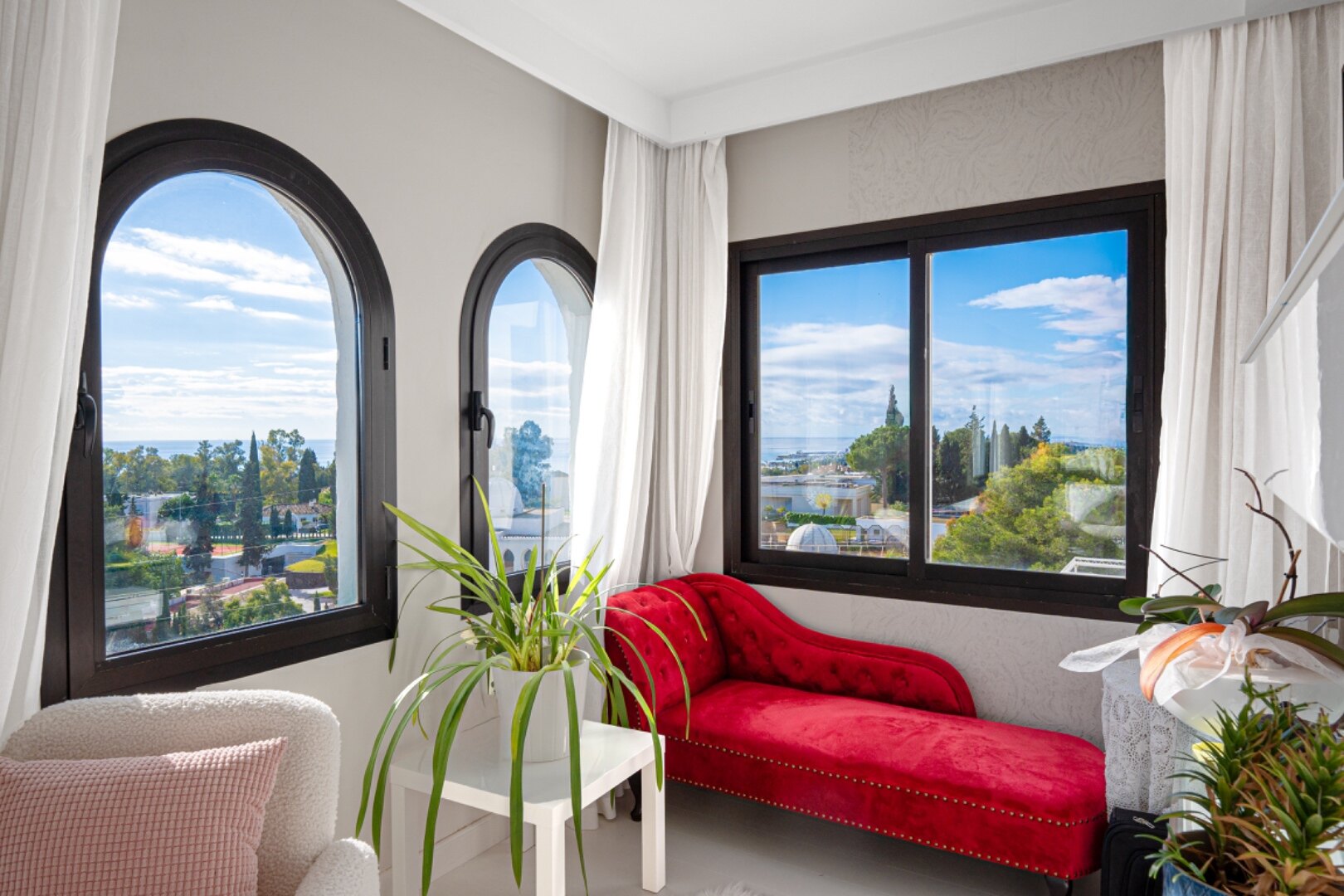 Stunning Marbella penthouse exudes elegance from its prime location within elite gated community.