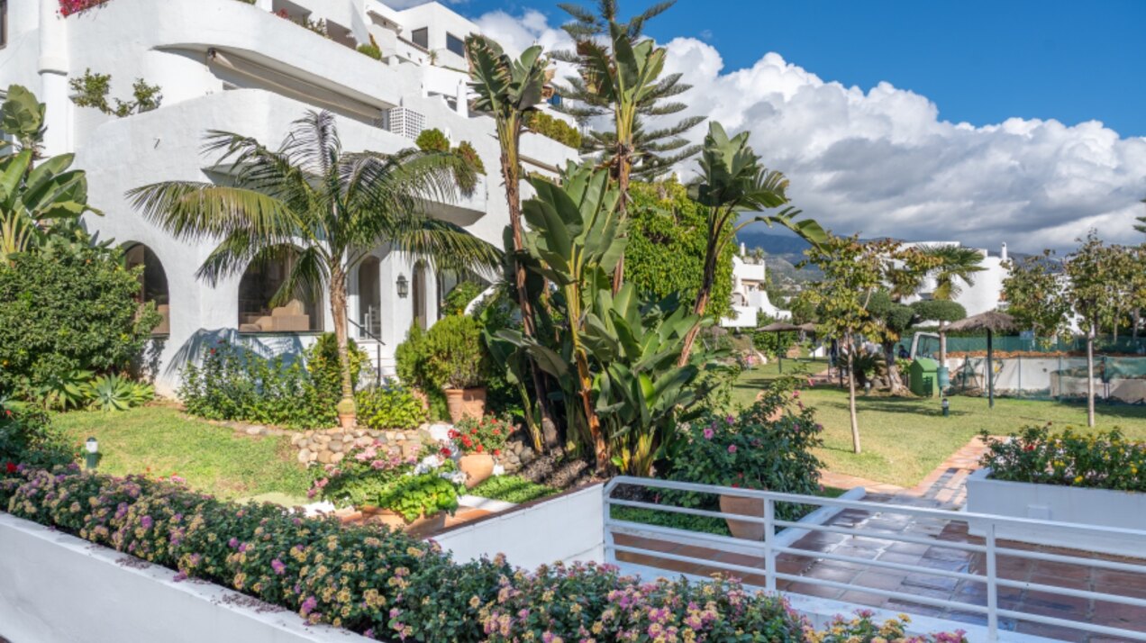 Stunning Marbella penthouse exudes elegance from its prime location within elite gated community.