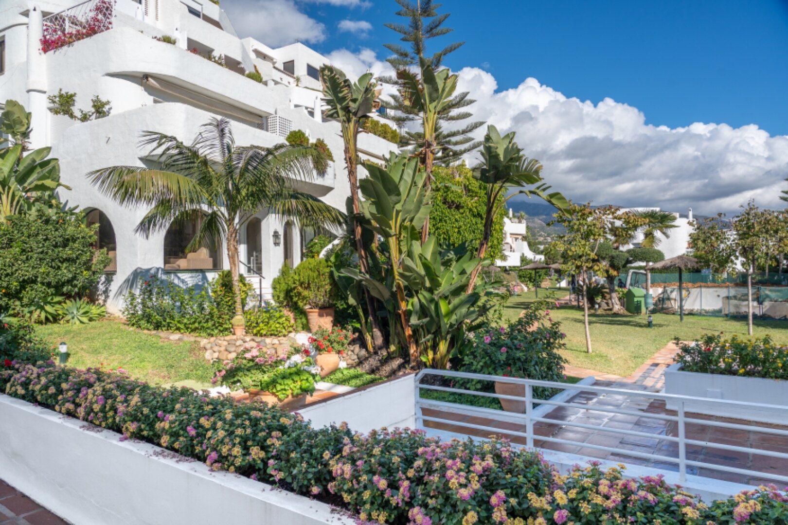 Stunning Marbella penthouse exudes elegance from its prime location within elite gated community.