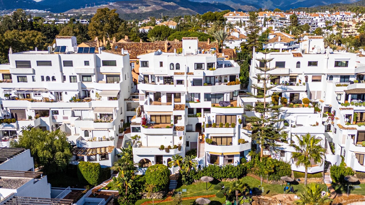 Stunning Marbella penthouse exudes elegance from its prime location within elite gated community.
