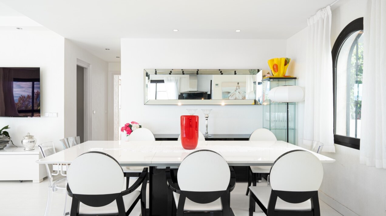 Stunning Marbella penthouse exudes elegance from its prime location within elite gated community.