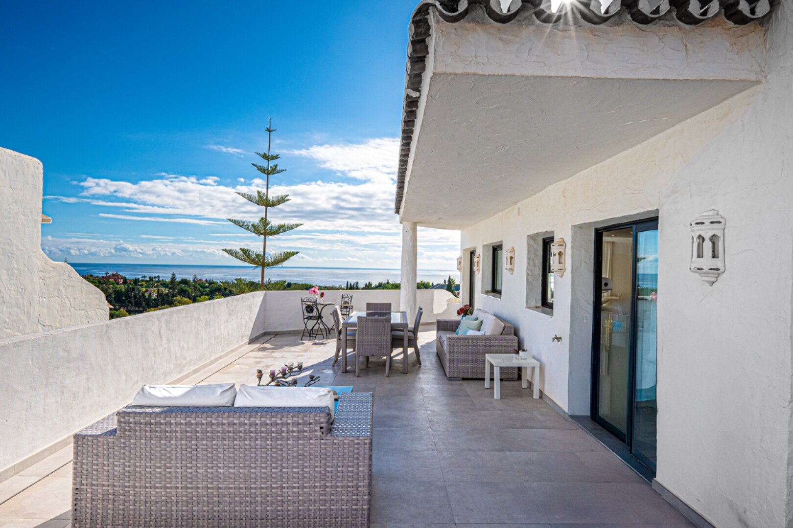 Stunning Marbella penthouse exudes elegance from its prime location within elite gated community.