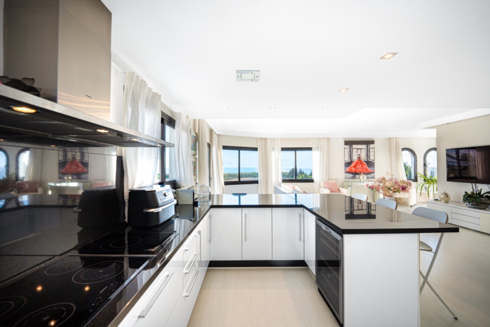 Stunning Marbella penthouse exudes elegance from its prime location within elite gated community.