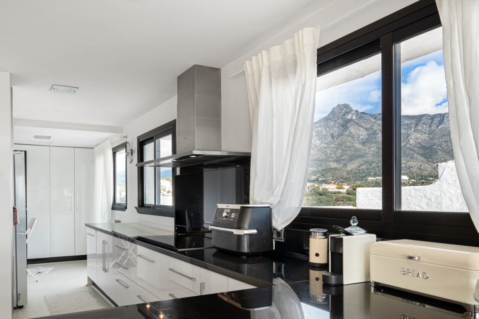 Stunning Marbella penthouse exudes elegance from its prime location within elite gated community.