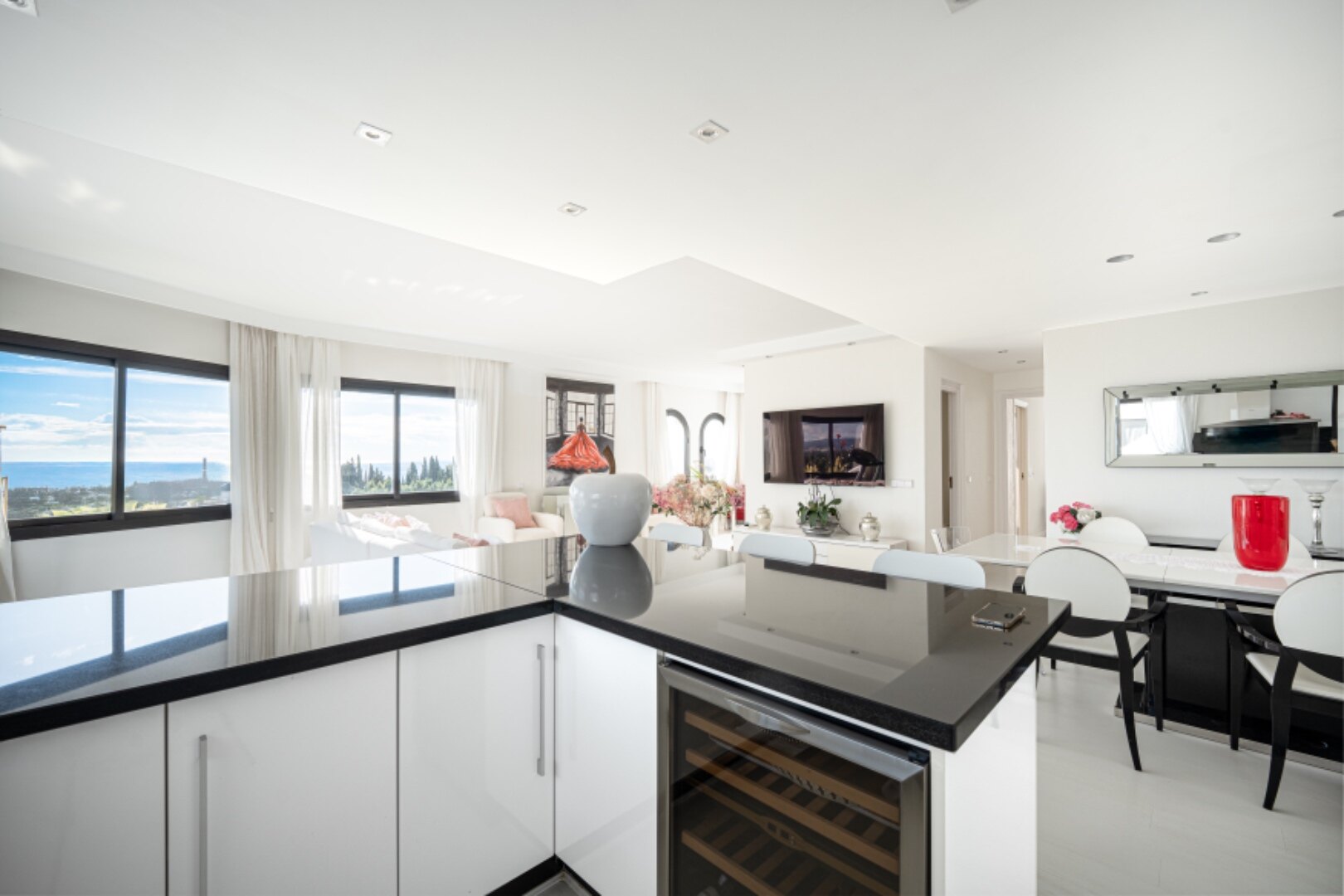Stunning Marbella penthouse exudes elegance from its prime location within elite gated community.