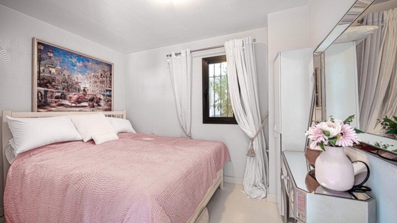 Stunning Marbella penthouse exudes elegance from its prime location within elite gated community.