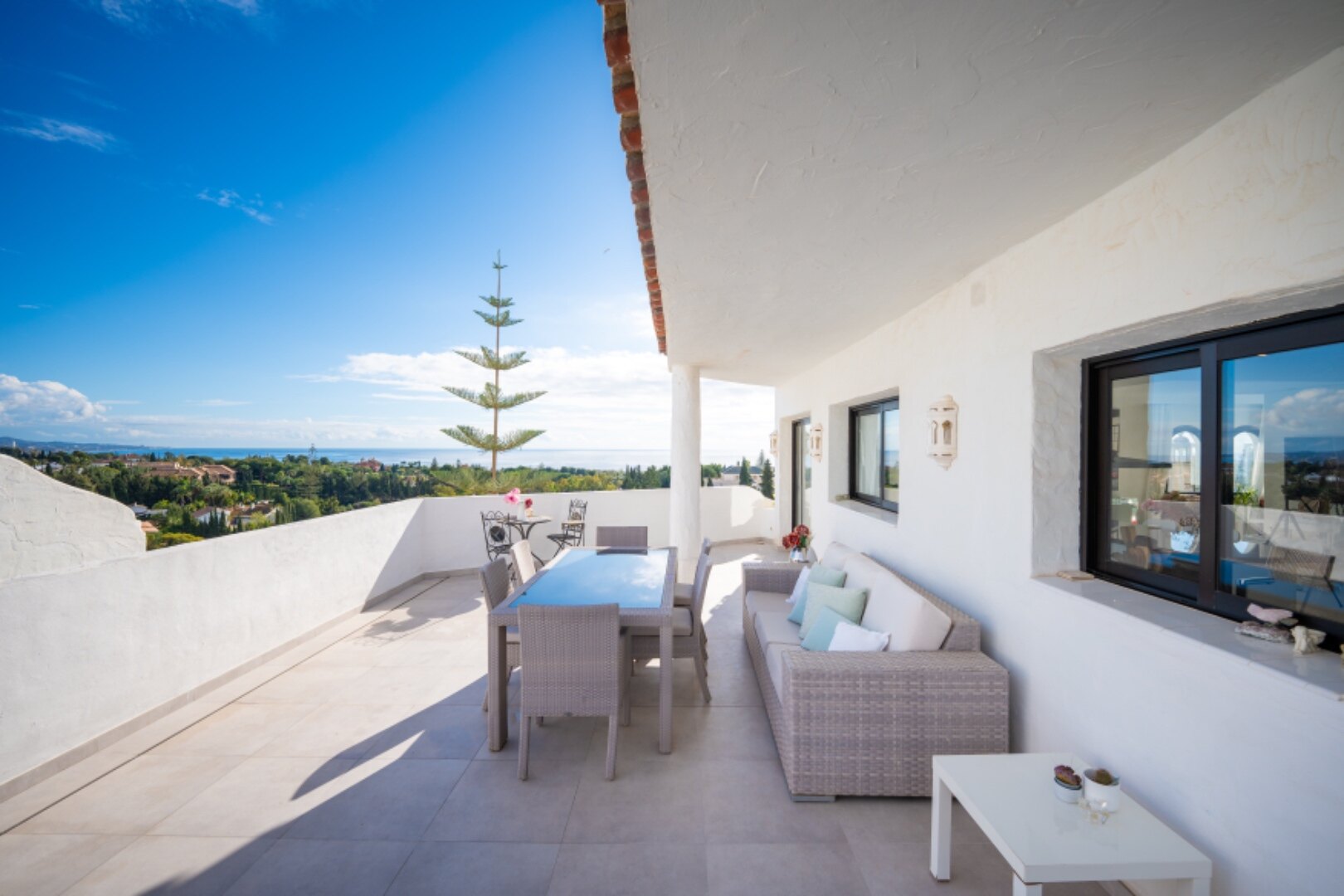 Stunning Marbella penthouse exudes elegance from its prime location within elite gated community.