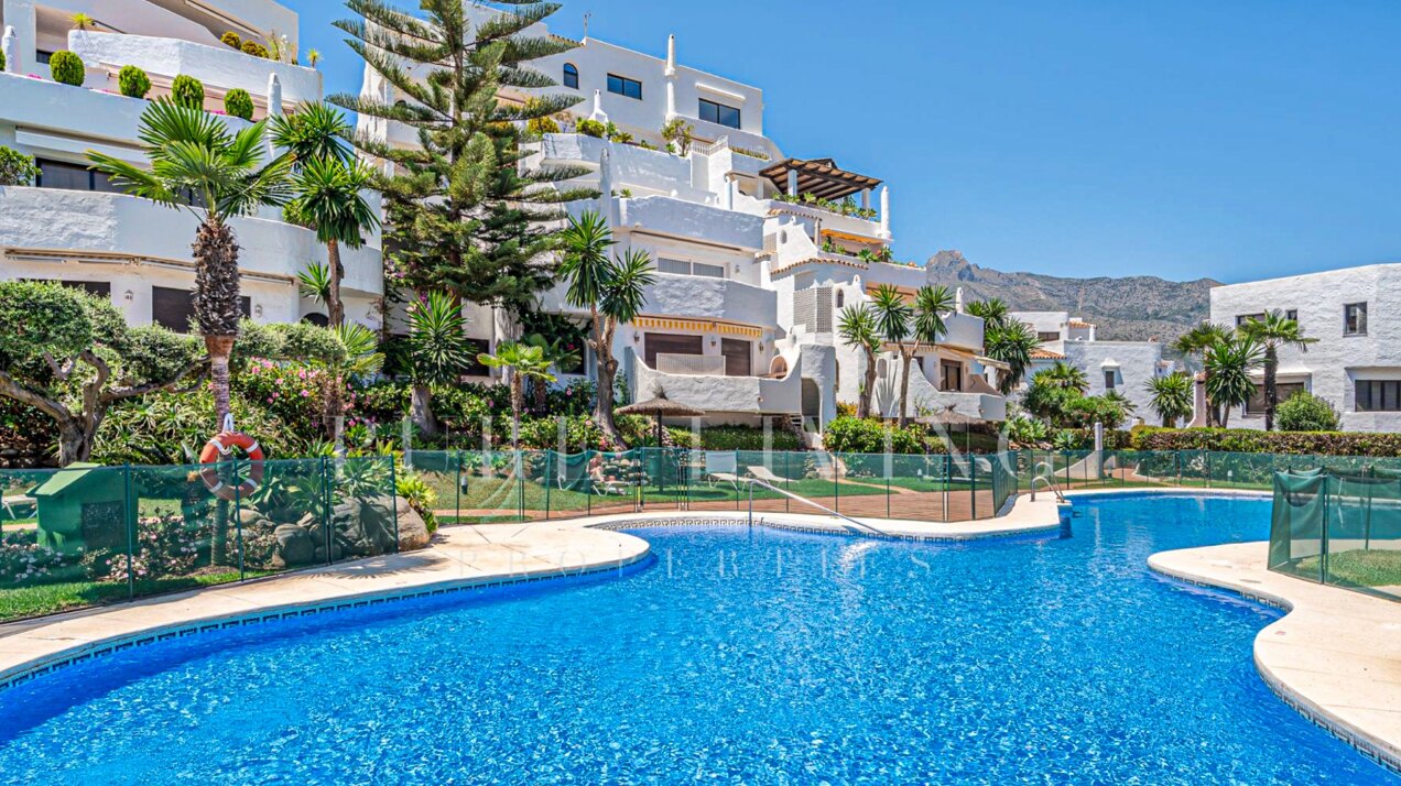 Stunning Marbella penthouse exudes elegance from its prime location within elite gated community.