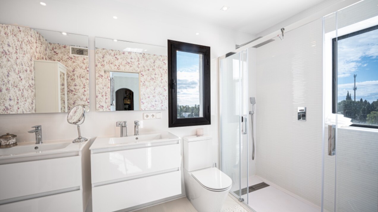 Stunning Marbella penthouse exudes elegance from its prime location within elite gated community.
