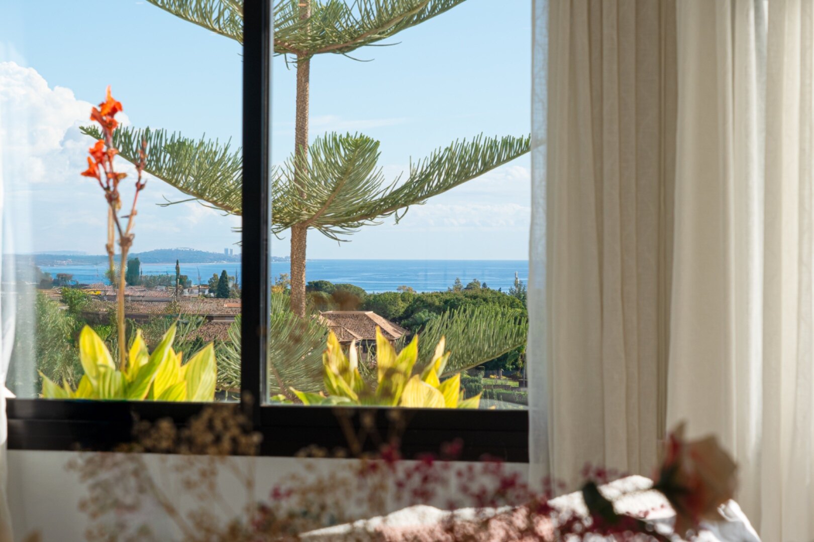 Stunning Marbella penthouse exudes elegance from its prime location within elite gated community.