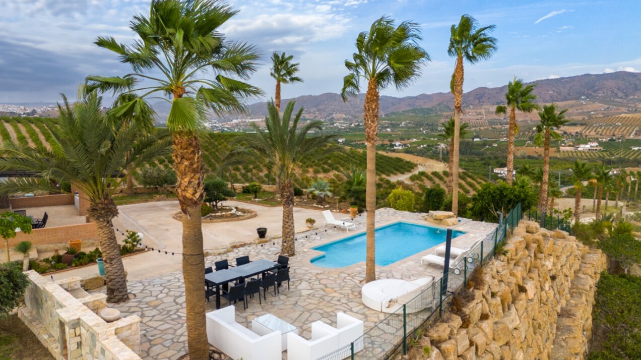 Incredible finca sits on vast private grounds in the midst of rolling hills of Pizarra, Malaga