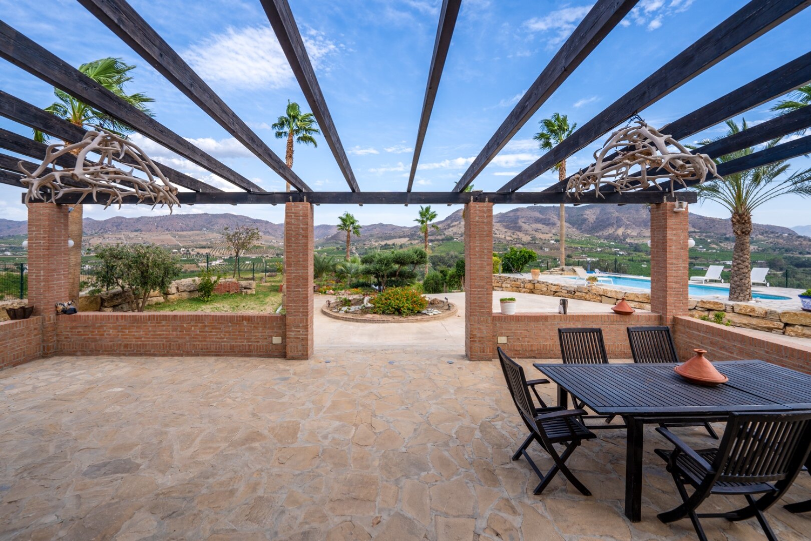 Incredible finca sits on vast private grounds in the midst of rolling hills of Pizarra, Malaga