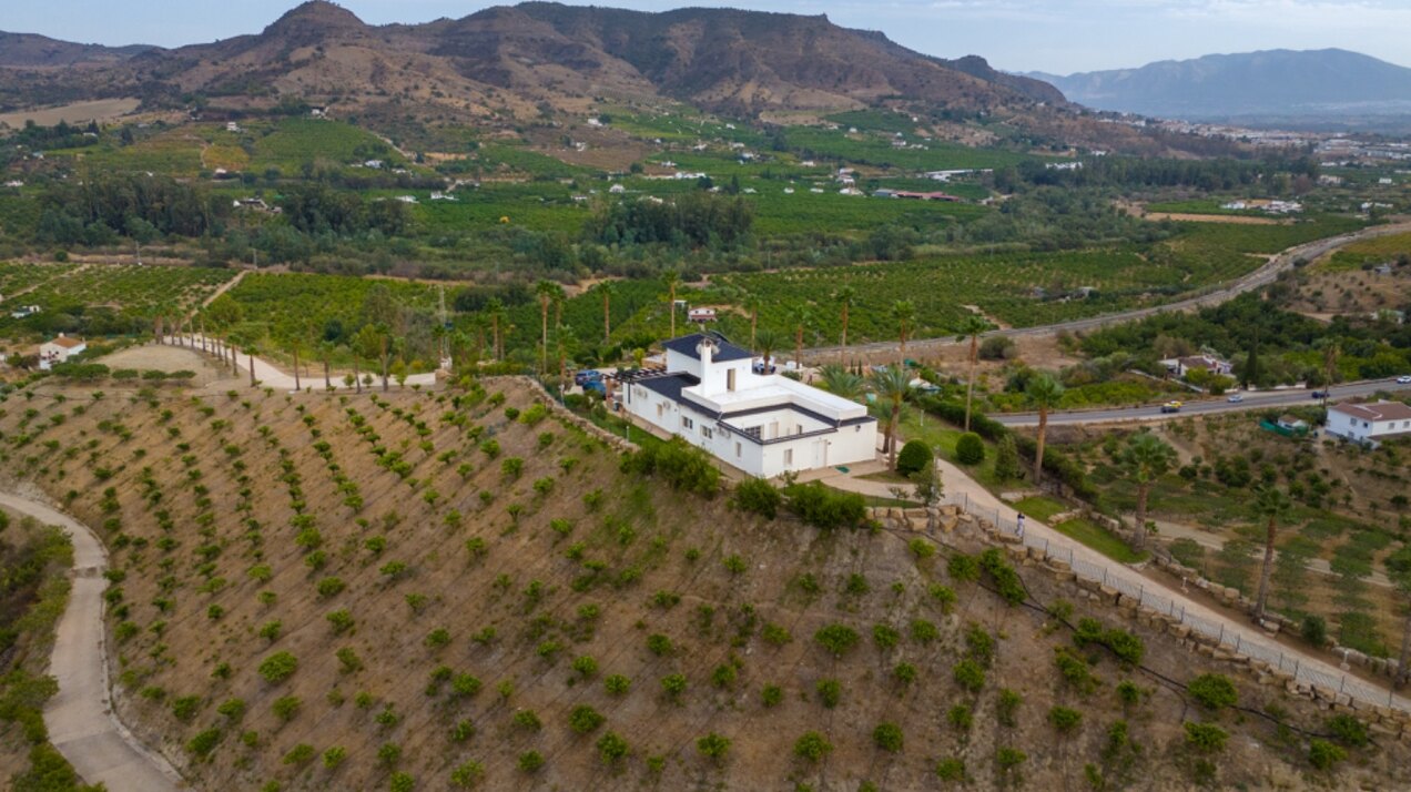 Incredible finca sits on vast private grounds in the midst of rolling hills of Pizarra, Malaga