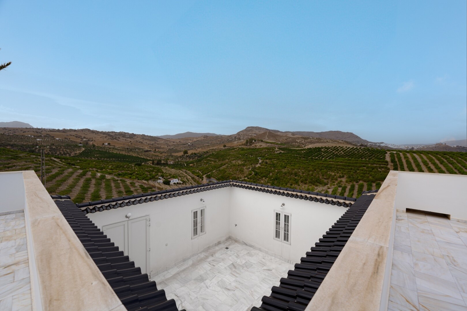 Incredible finca sits on vast private grounds in the midst of rolling hills of Pizarra, Malaga