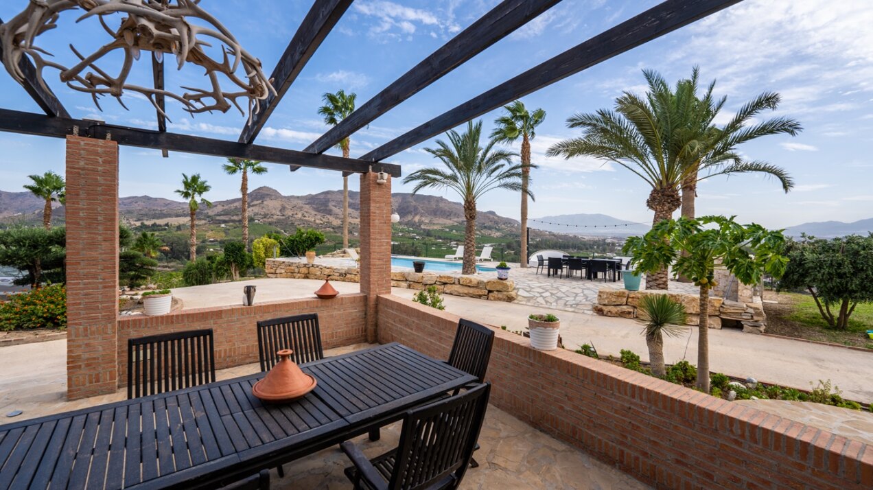 Incredible finca sits on vast private grounds in the midst of rolling hills of Pizarra, Malaga