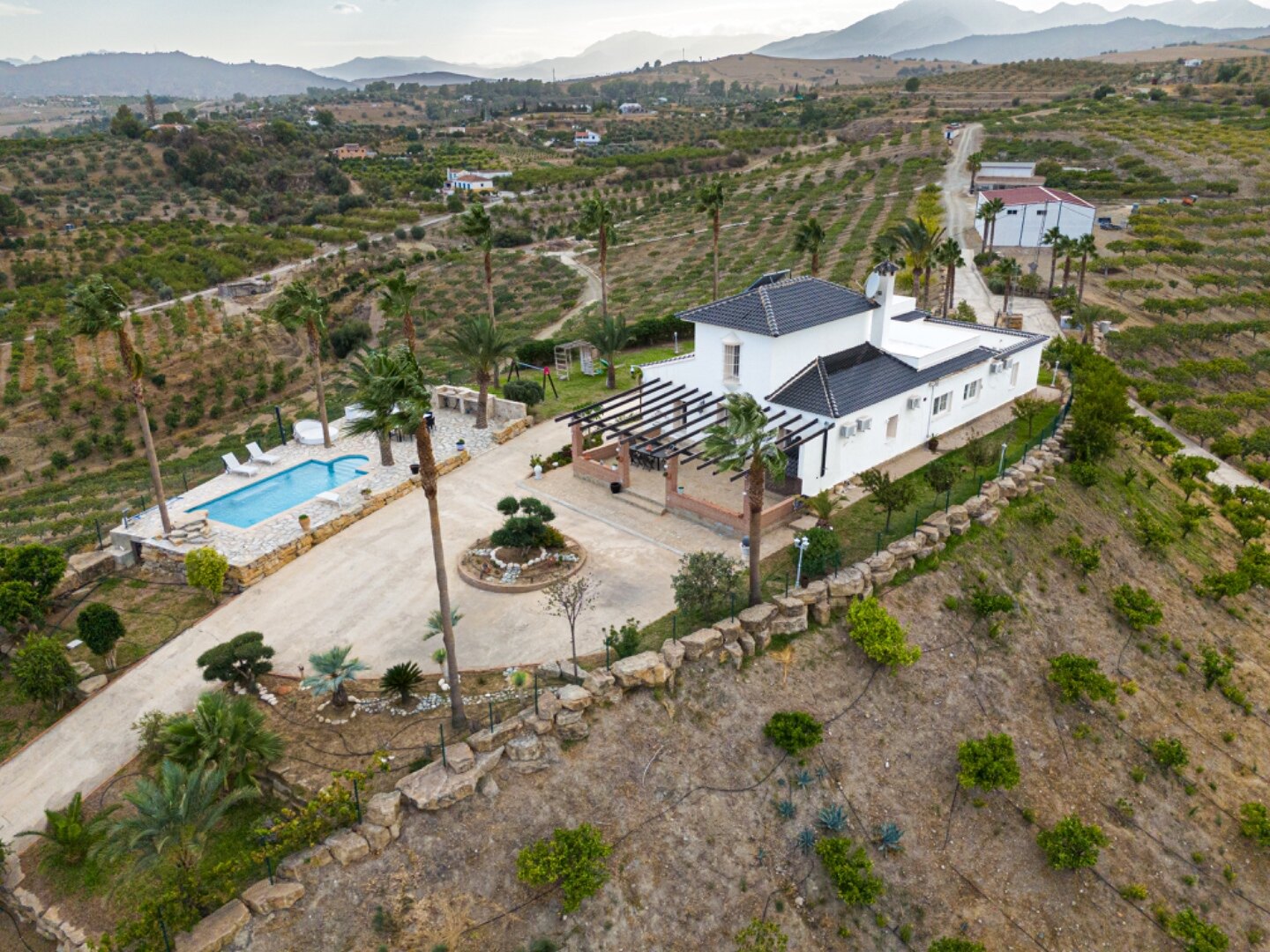 Incredible finca sits on vast private grounds in the midst of rolling hills of Pizarra, Malaga