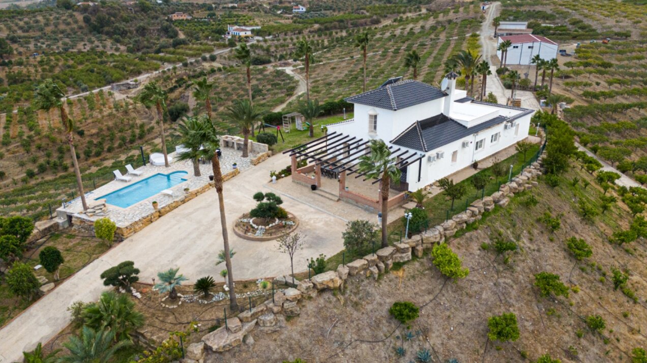 Incredible finca sits on vast private grounds in the midst of rolling hills of Pizarra, Malaga