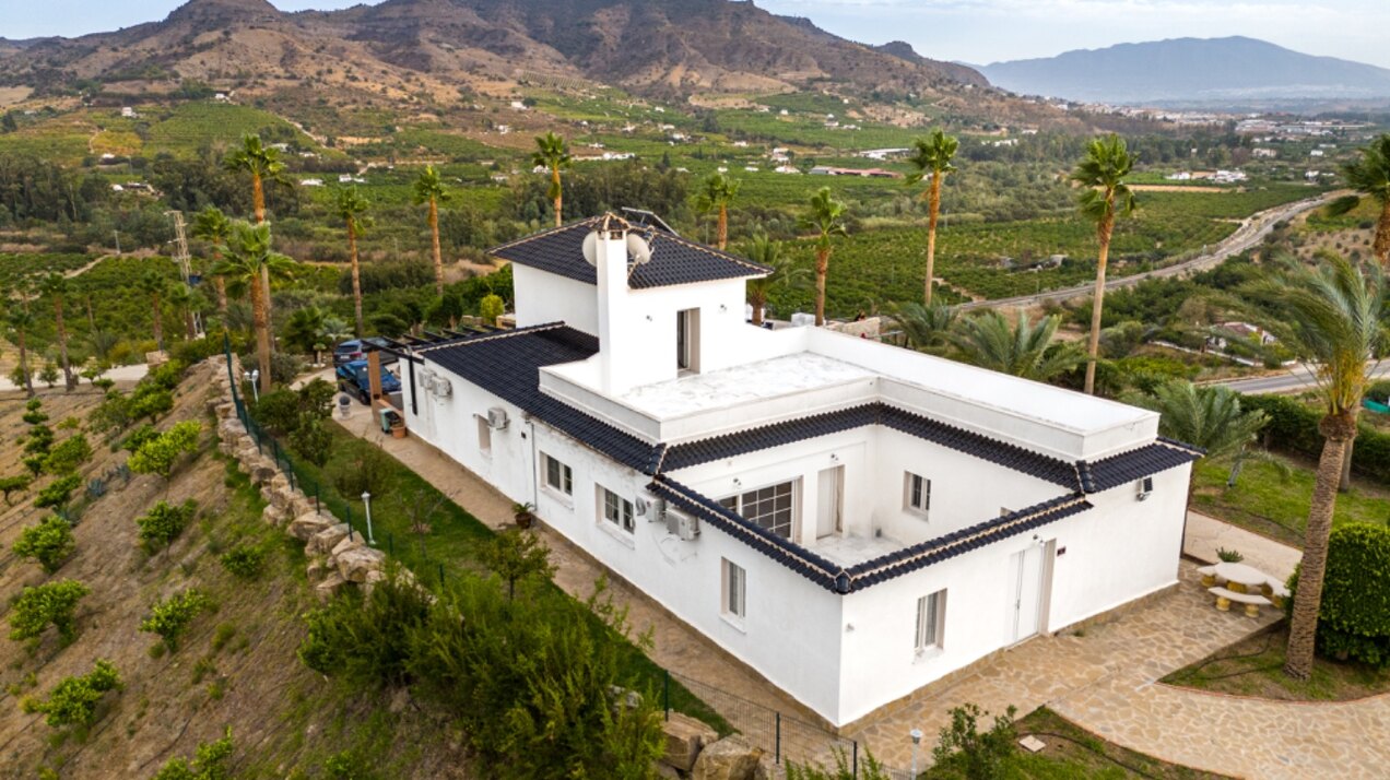 Incredible finca sits on vast private grounds in the midst of rolling hills of Pizarra, Malaga