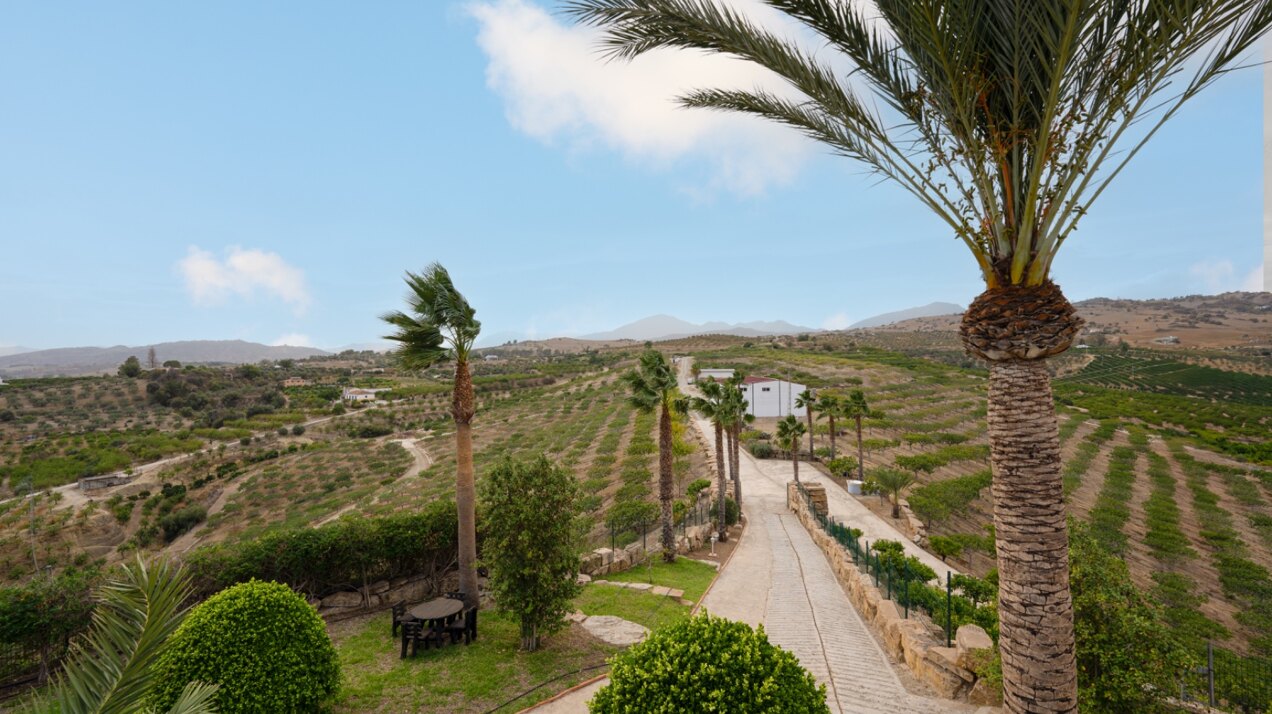 Incredible finca sits on vast private grounds in the midst of rolling hills of Pizarra, Malaga