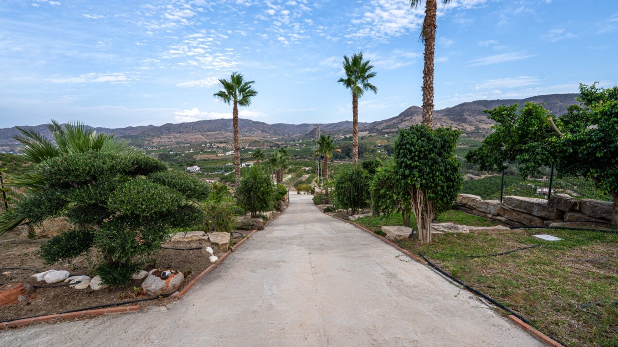 Incredible finca sits on vast private grounds in the midst of rolling hills of Pizarra, Malaga