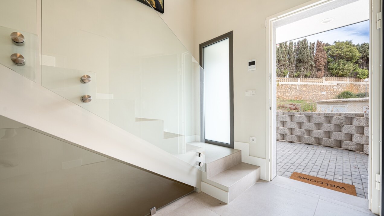 Walking distance to the beach and golf, this elegant townhouse will captivate and enthrall