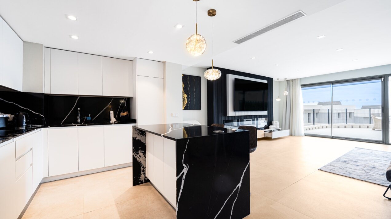 Walking distance to the beach and golf, this elegant townhouse will captivate and enthrall