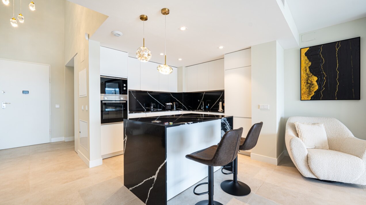 Walking distance to the beach and golf, this elegant townhouse will captivate and enthrall