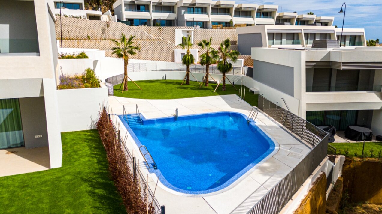 Walking distance to the beach and golf, this elegant townhouse will captivate and enthrall