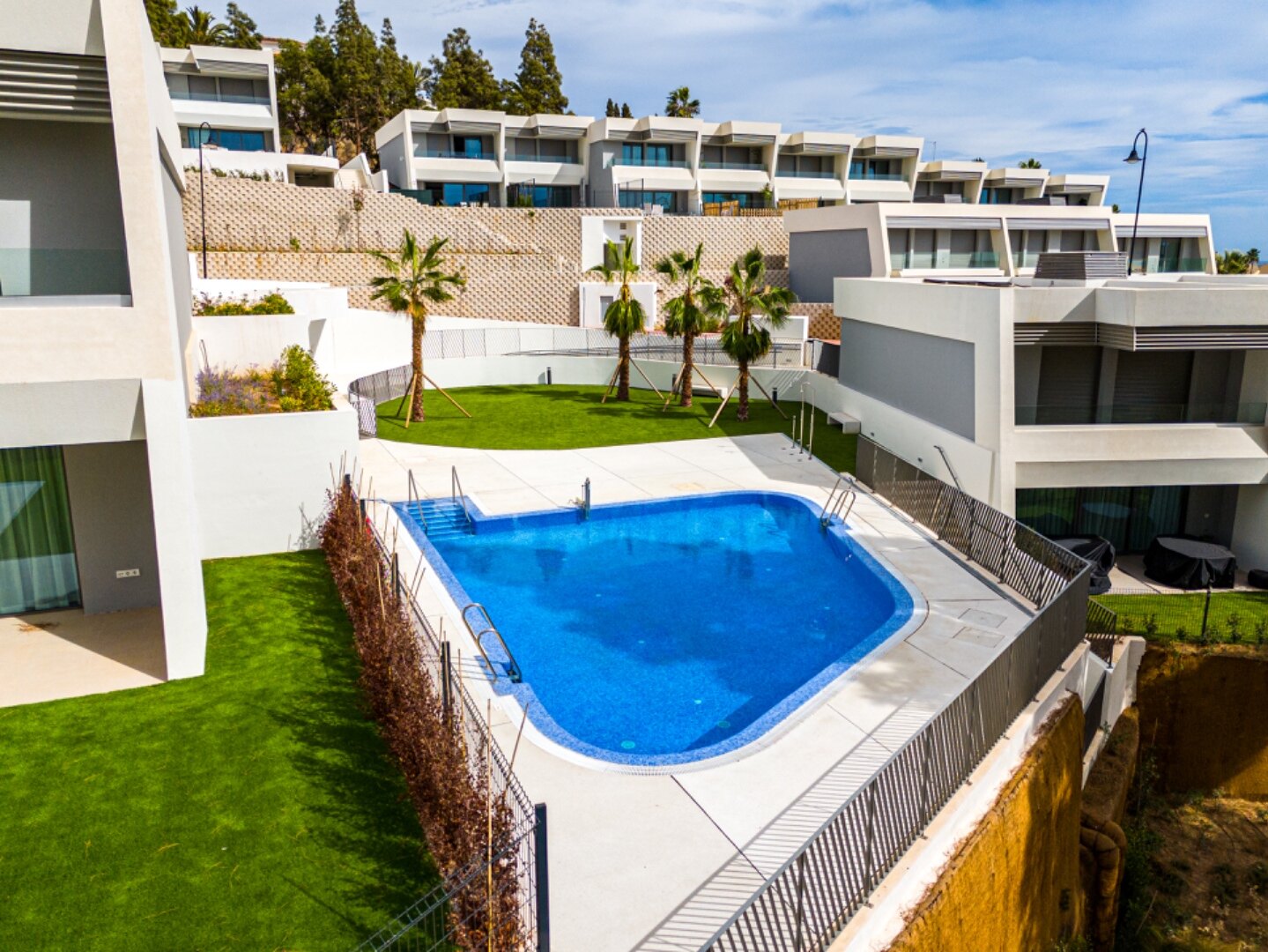 Walking distance to the beach and golf, this elegant townhouse will captivate and enthrall