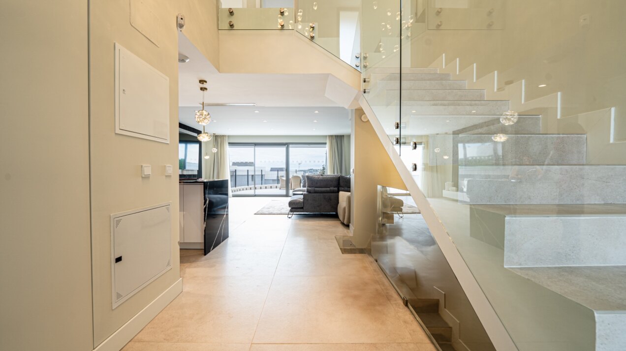 Walking distance to the beach and golf, this elegant townhouse will captivate and enthrall
