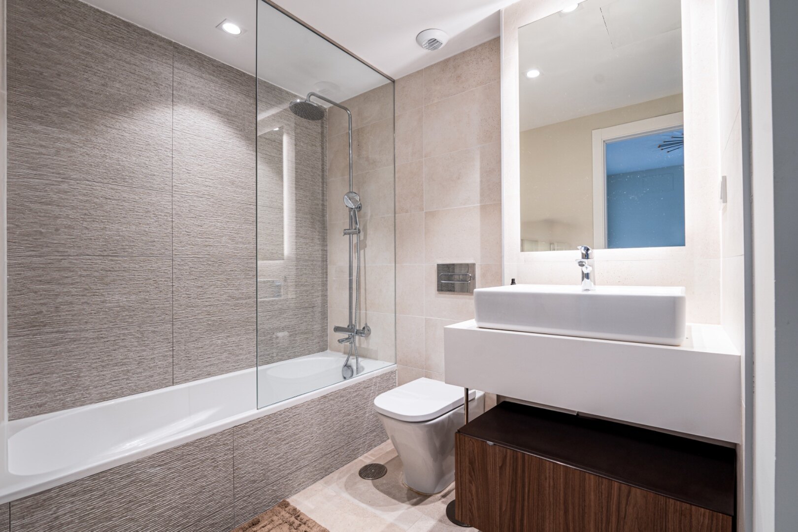 Walking distance to the beach and golf, this elegant townhouse will captivate and enthrall