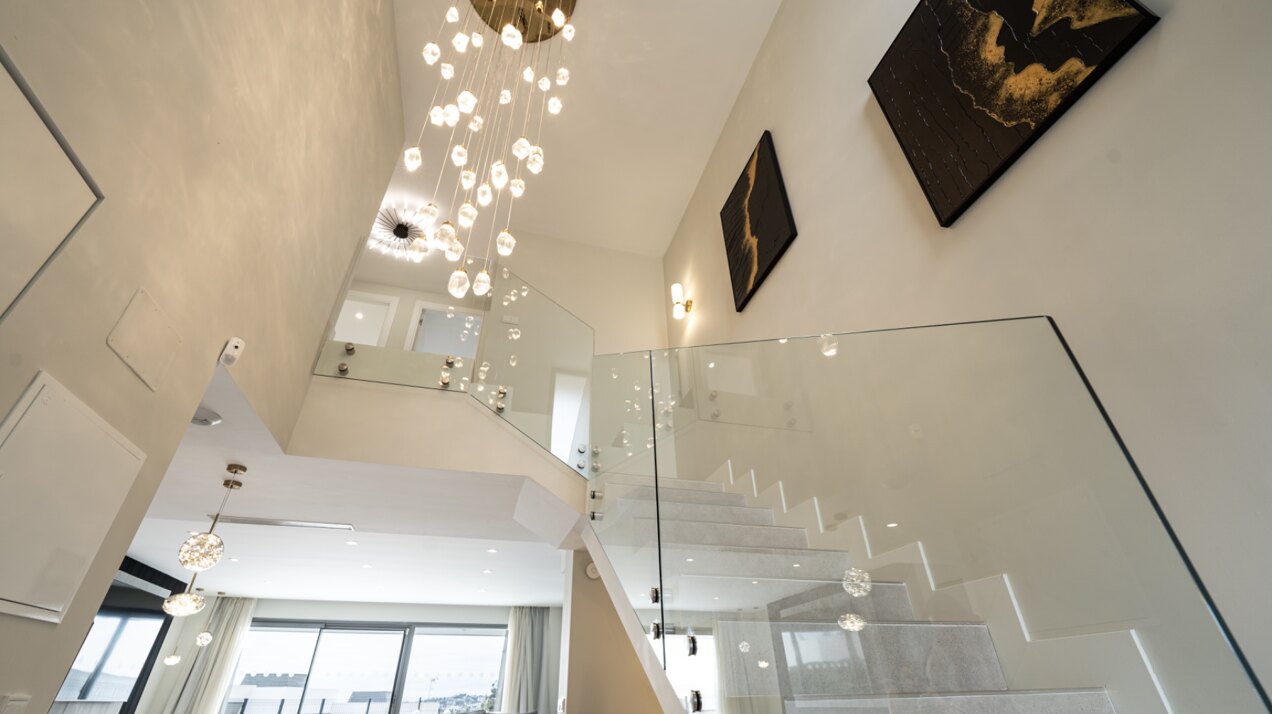 Walking distance to the beach and golf, this elegant townhouse will captivate and enthrall