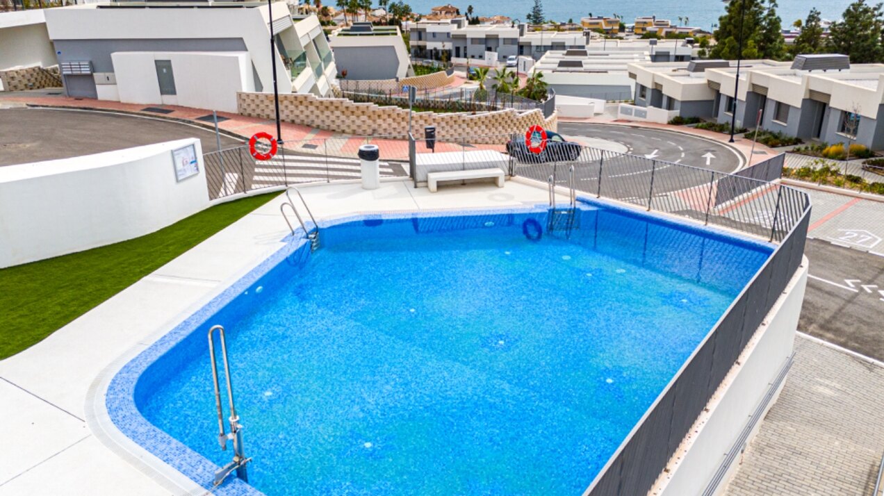 Walking distance to the beach and golf, this elegant townhouse will captivate and enthrall