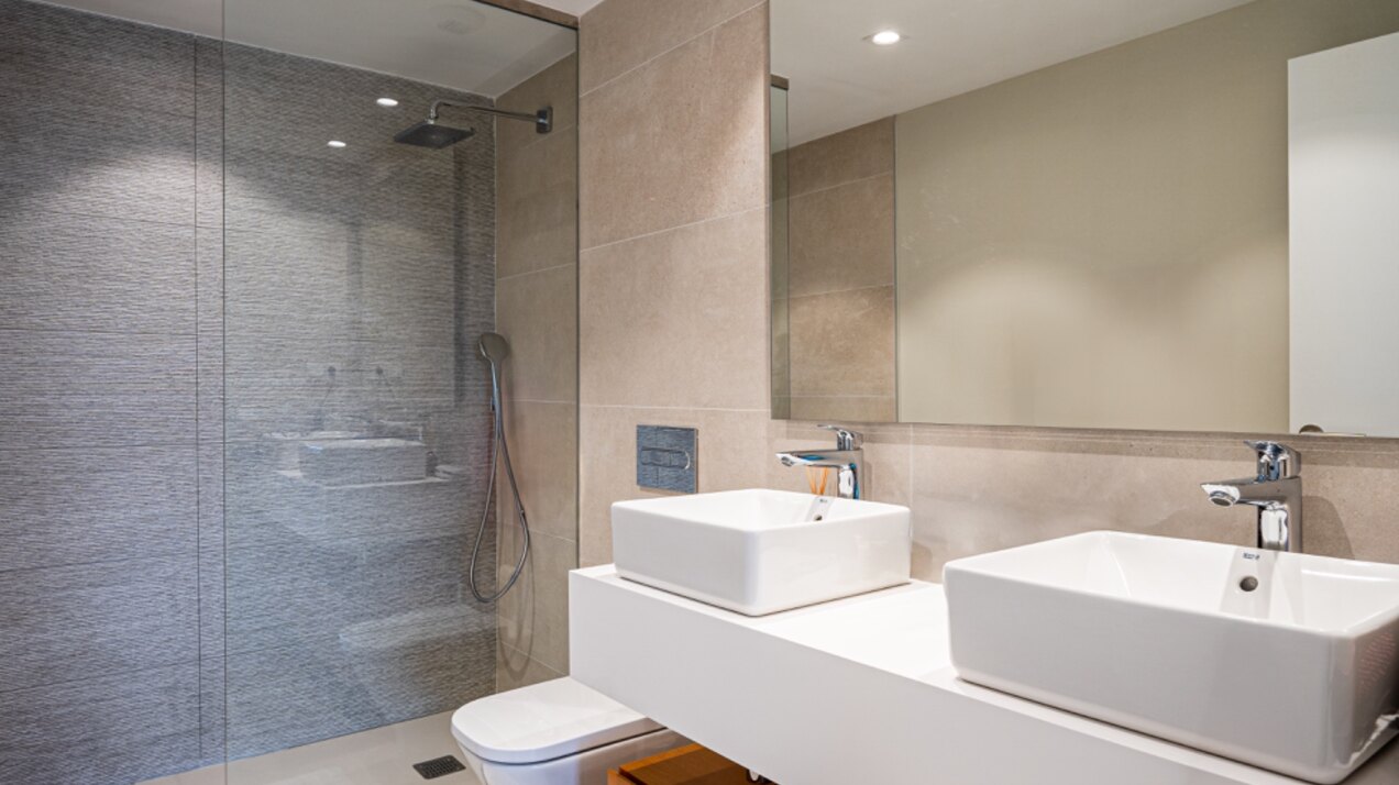 Walking distance to the beach and golf, this elegant townhouse will captivate and enthrall