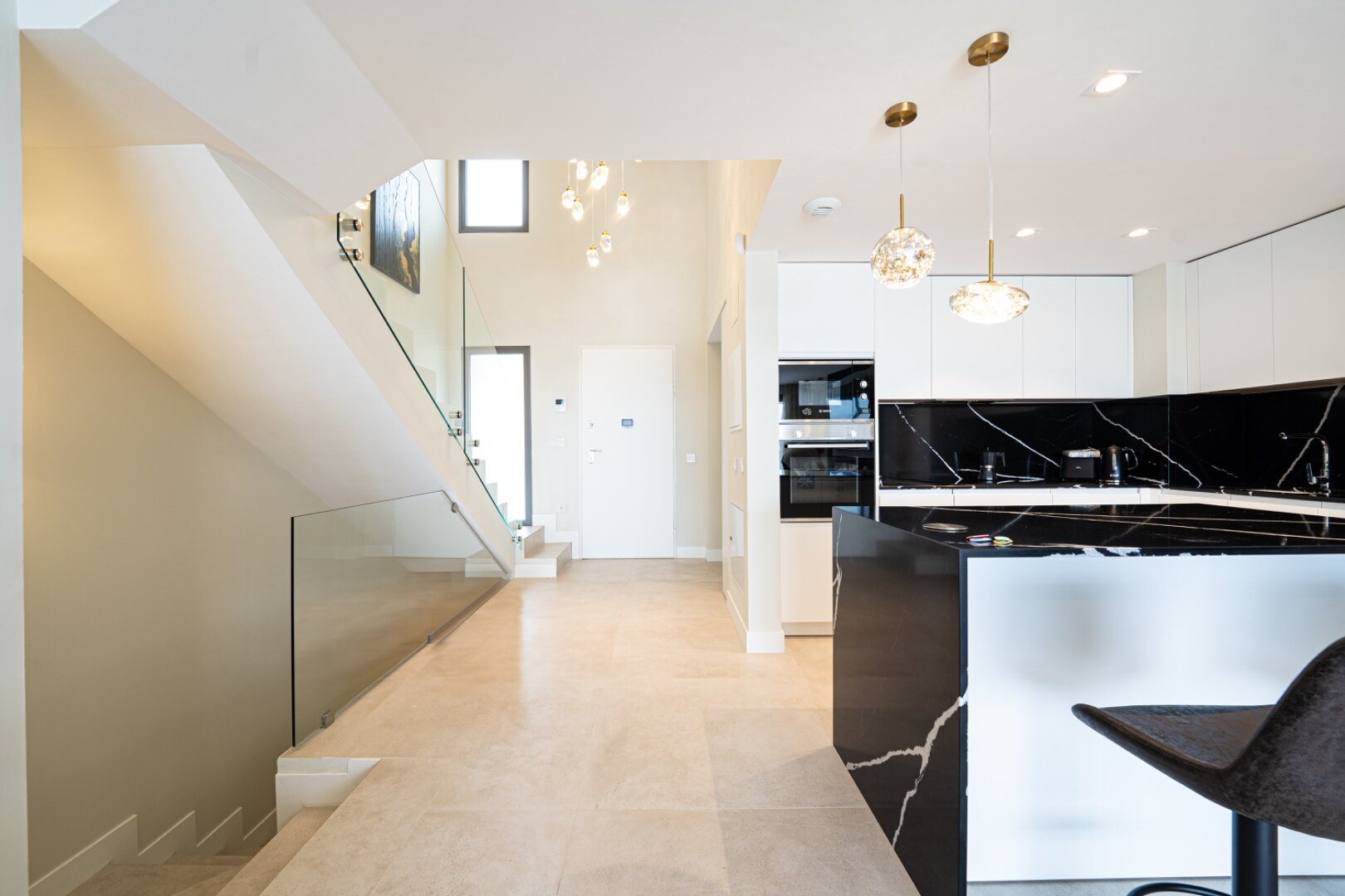 Walking distance to the beach and golf, this elegant townhouse will captivate and enthrall