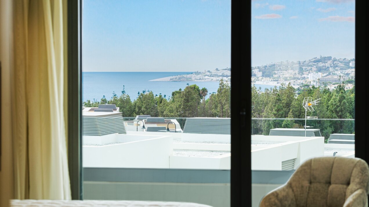 Walking distance to the beach and golf, this elegant townhouse will captivate and enthrall