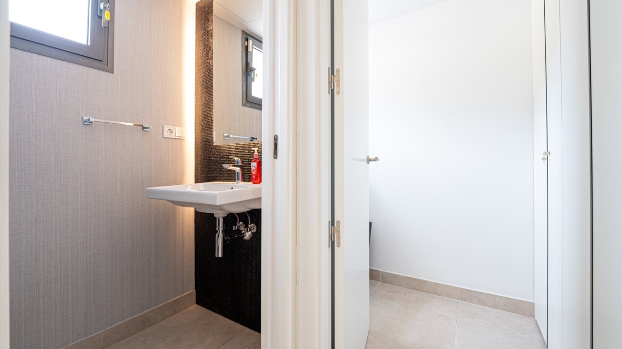 Walking distance to the beach and golf, this elegant townhouse will captivate and enthrall