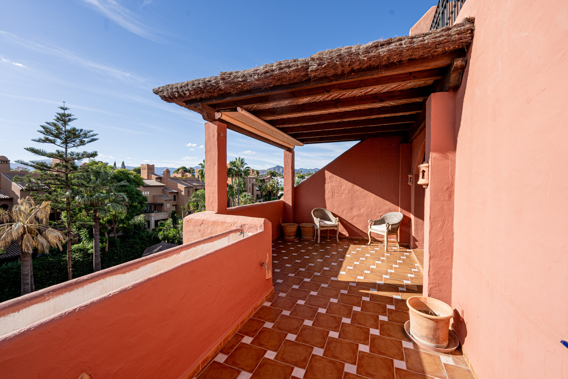 Palatial duplex penthouse sits atop its throne in one of Esteponas most exclusive gate communities