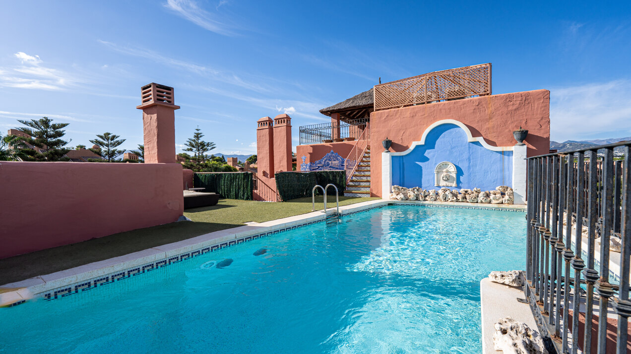 Palatial duplex penthouse sits atop its throne in one of Esteponas most exclusive gate communities