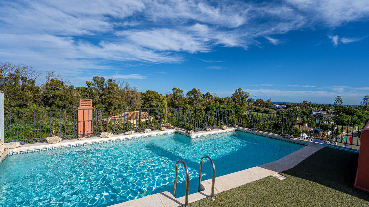Palatial duplex penthouse sits atop its throne in one of Esteponas most exclusive gate communities
