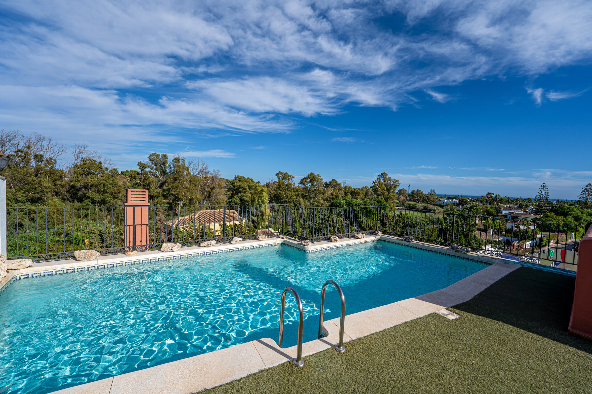 Palatial duplex penthouse sits atop its throne in one of Esteponas most exclusive gate communities