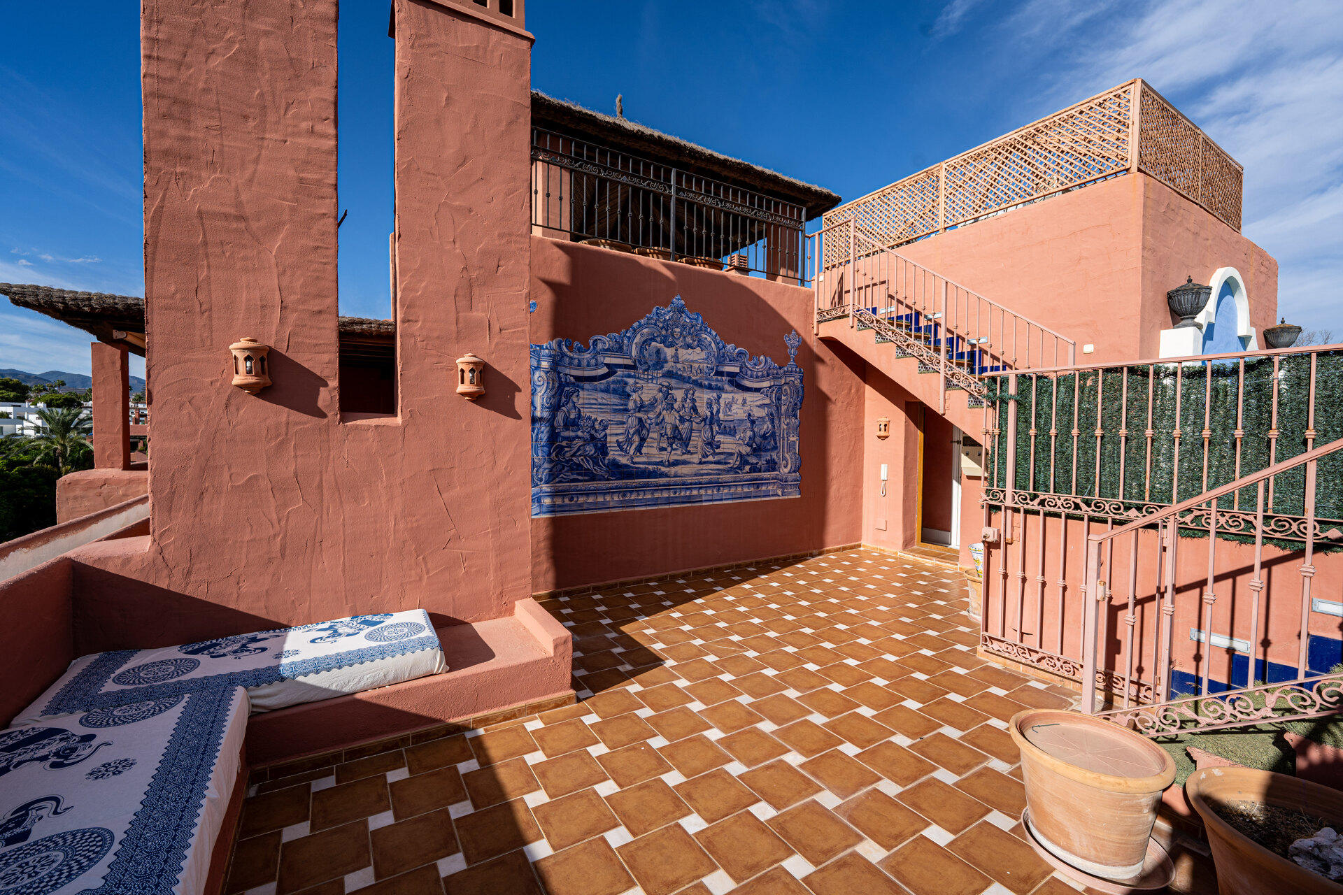 Palatial duplex penthouse sits atop its throne in one of Esteponas most exclusive gate communities