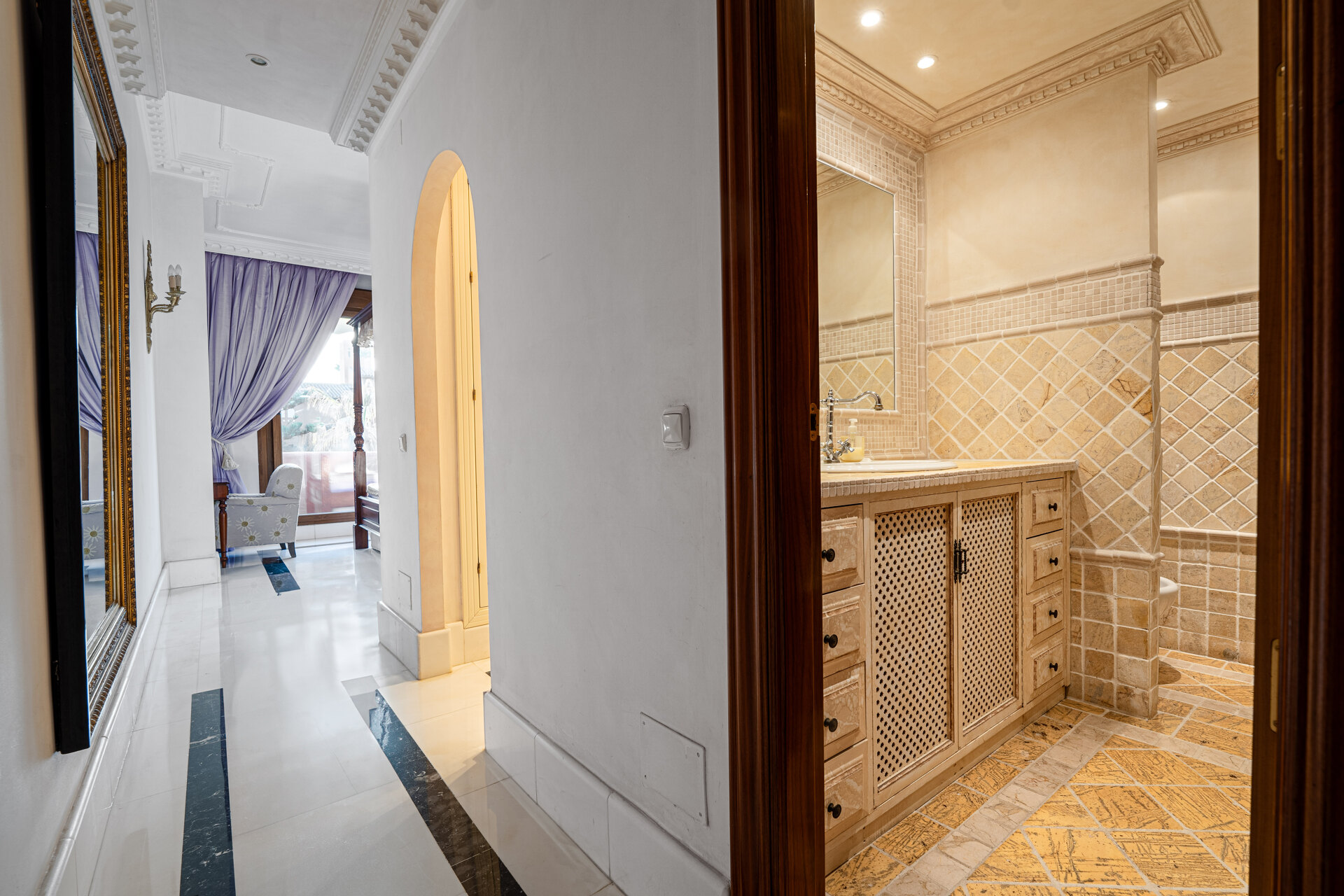Palatial duplex penthouse sits atop its throne in one of Esteponas most exclusive gate communities