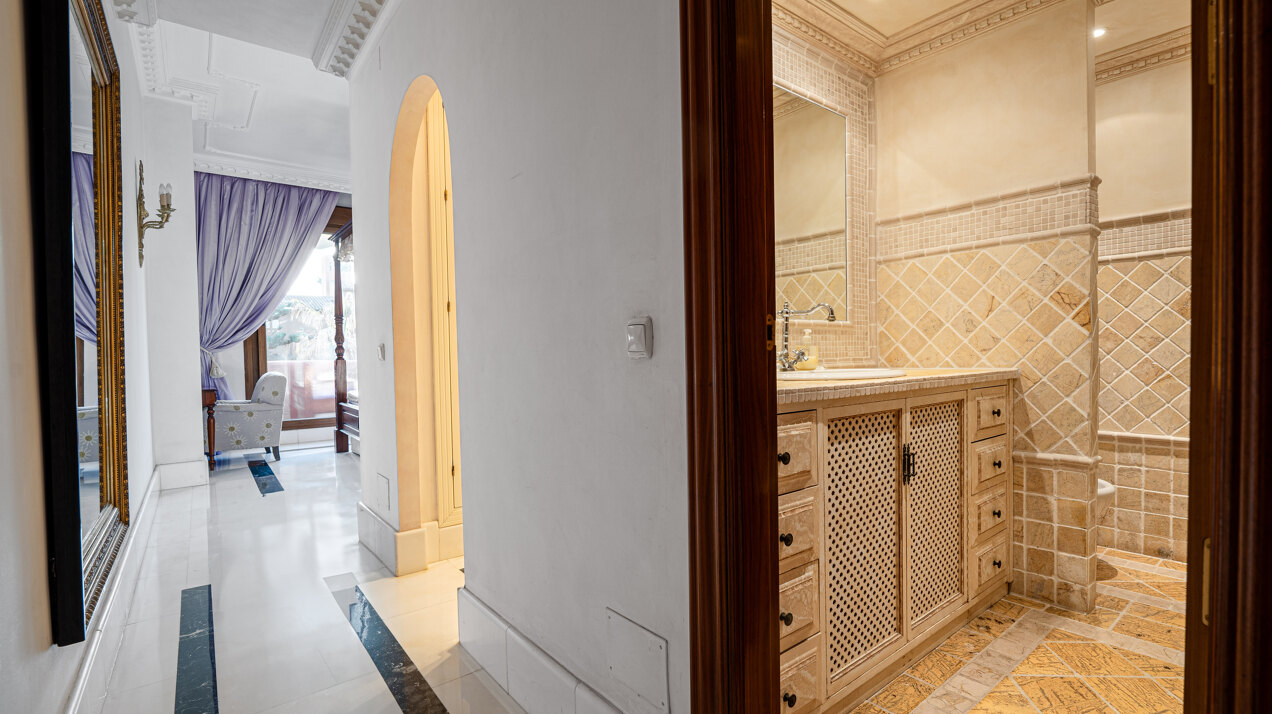Palatial duplex penthouse sits atop its throne in one of Esteponas most exclusive gate communities