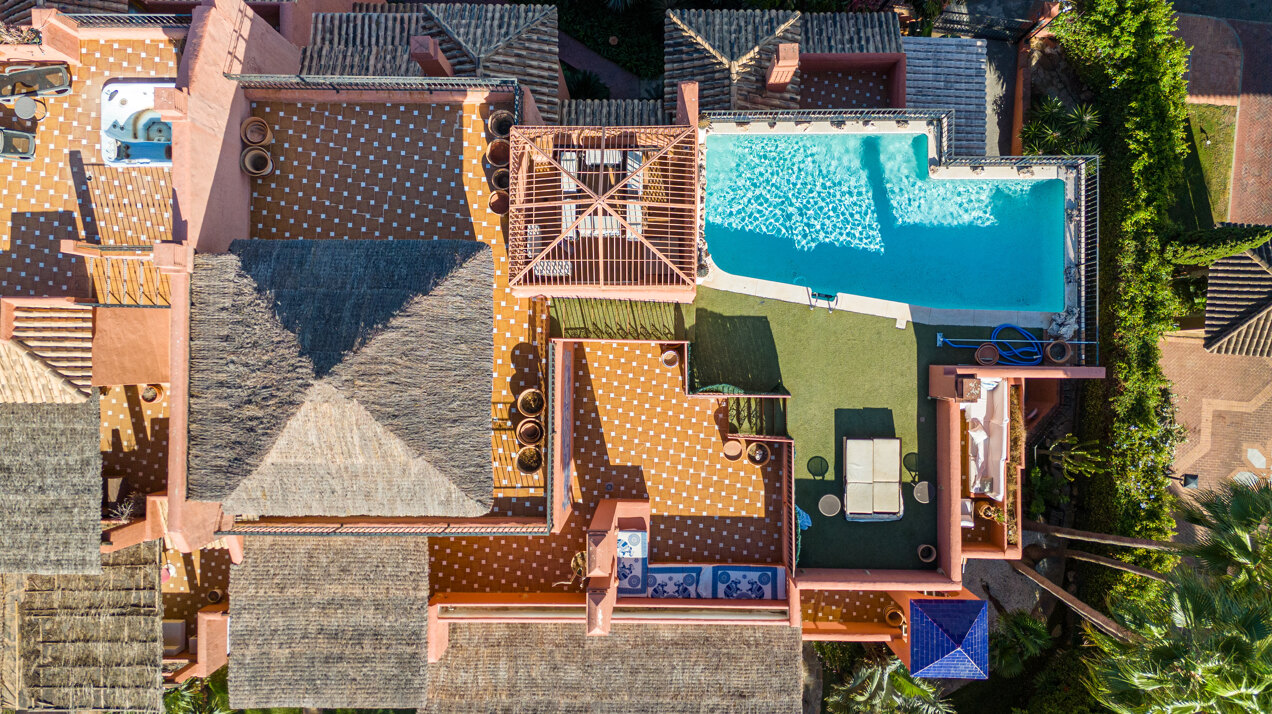 Palatial duplex penthouse sits atop its throne in one of Esteponas most exclusive gate communities