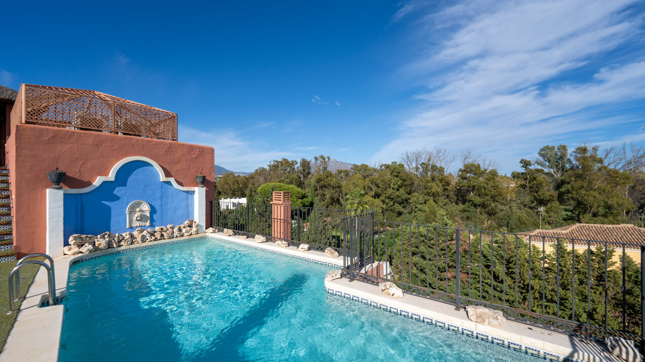 Palatial duplex penthouse sits atop its throne in one of Esteponas most exclusive gate communities